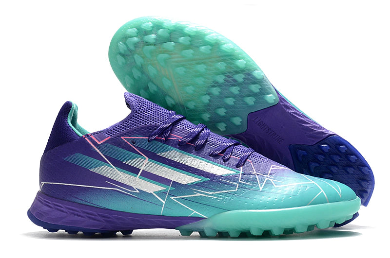 Chuteira Society Adidas X Speedflow.1 CHAMPIONS LEAGUE TF